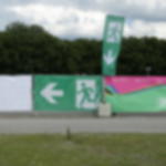 Bauzaunfahne mit Piktogramm - Notausgang Bauzaunfahne mit Piktogramm - Notausgang