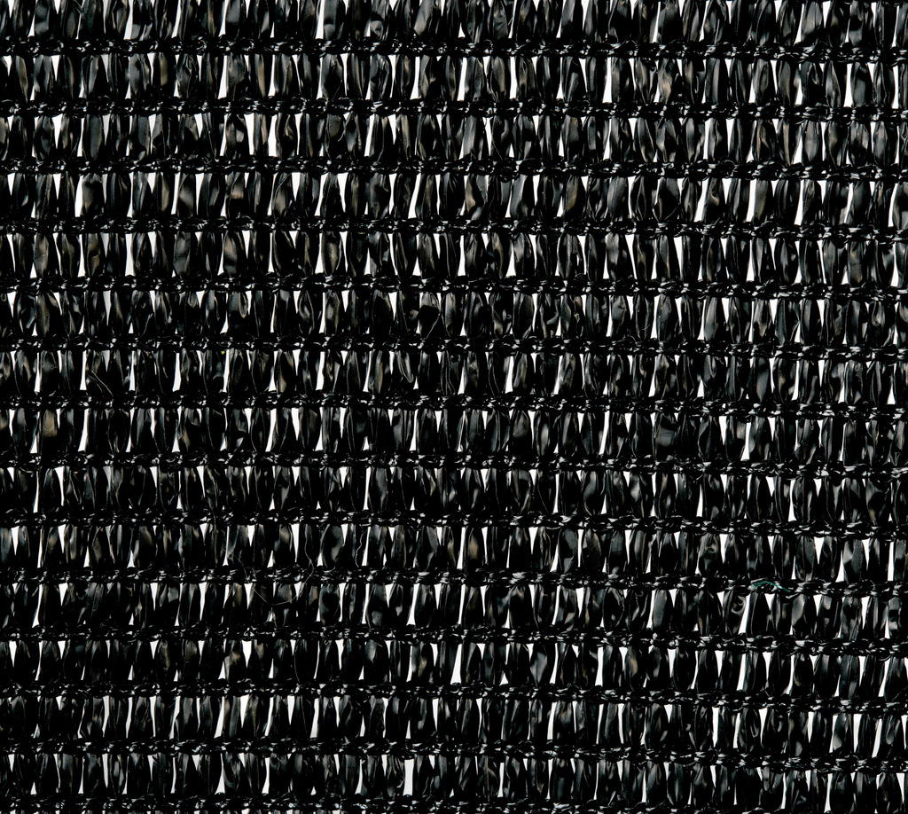 Bildfüllende Nahaufnahme der feinmaschigen Oberflächenstruktur einer schwarzen Gaze