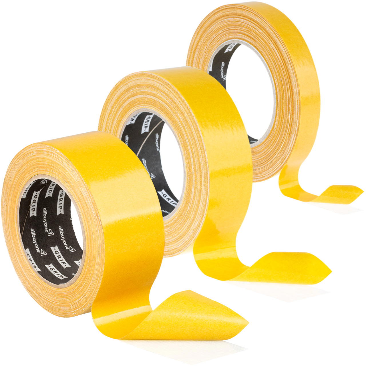 Drei schräg versetzt stehende Rollen Doppelklebeband mit gelbem Papierschutz, leicht abgerollt in gestaffelten Breiten